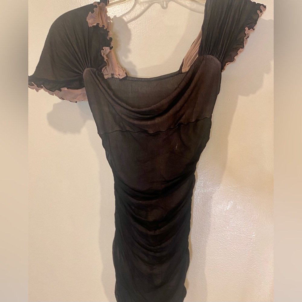 Beautiful, sheer mesh top with asymmetrical sleeves